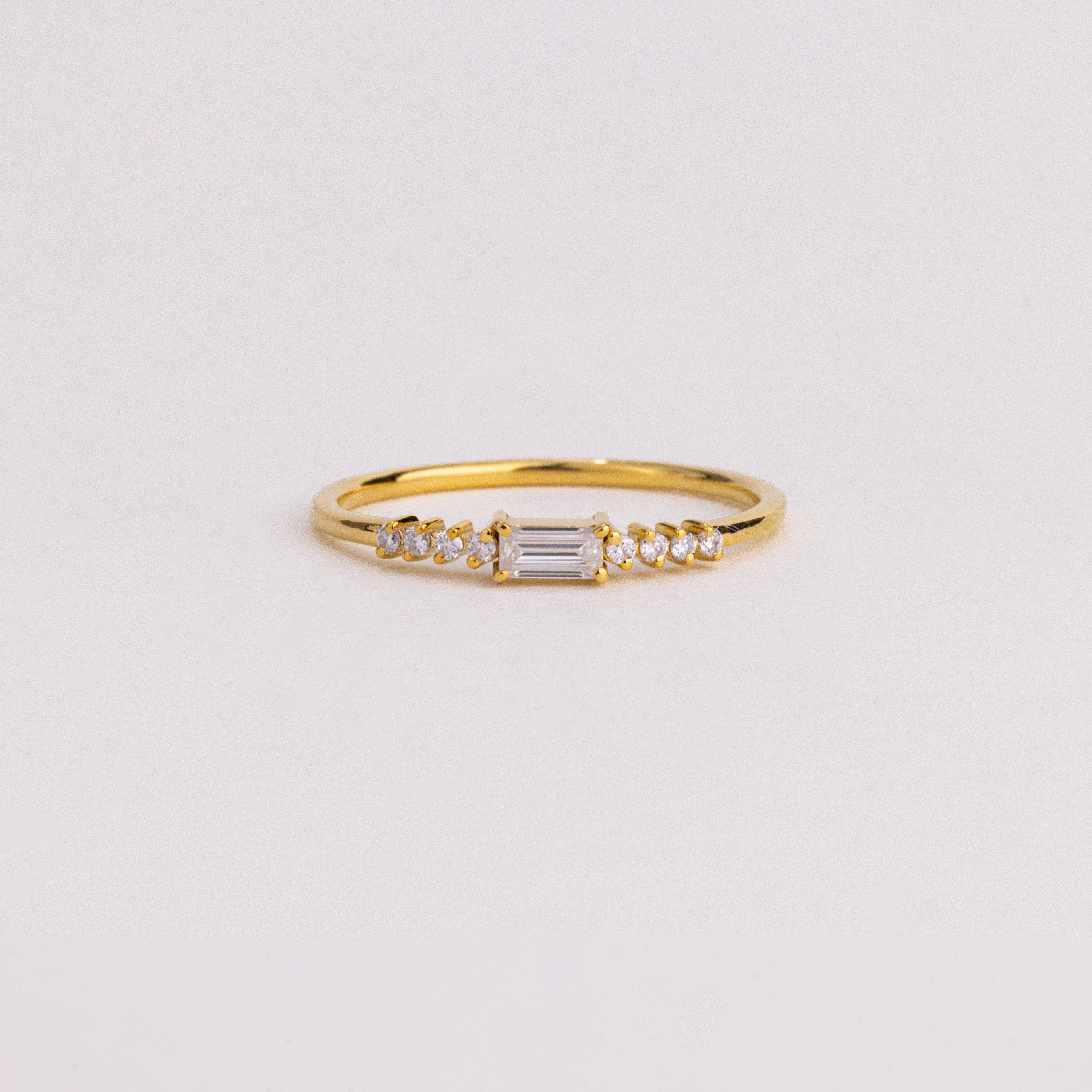 East West Emerald Cut Lab Grown Diamond Ring, Graduated Round Diamond Band