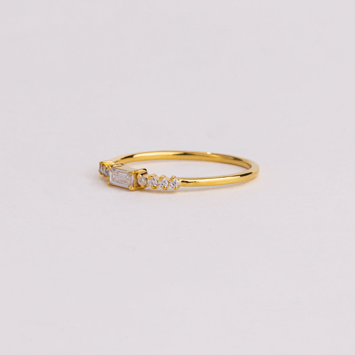 East West Emerald Cut Lab Grown Diamond Ring, Graduated Round Diamond Band