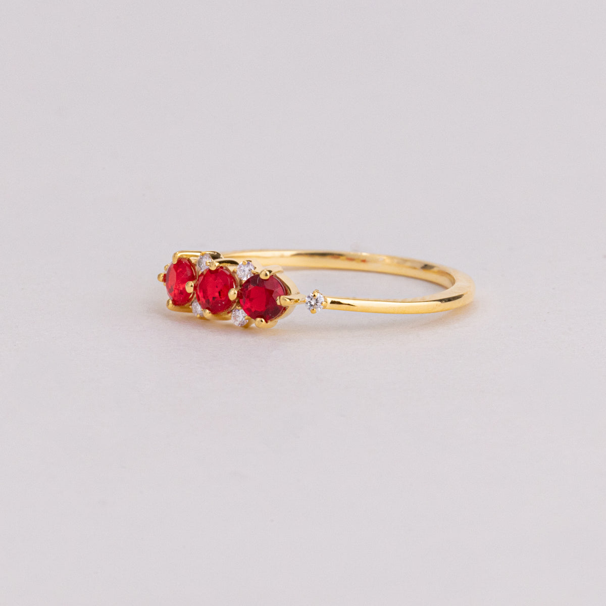 Round Ruby and Lab Grown Diamond Three Stone Ring