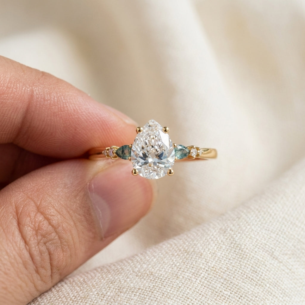 Pear Cut Lab Grown Diamond Engagement Ring, Teal Sapphire Side Stones, Rose Gold Three Stone Proposal Ring